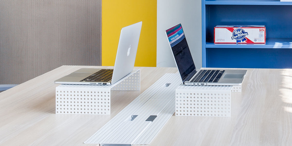 Heartwork Monitor Stands in white with laptops in office setting