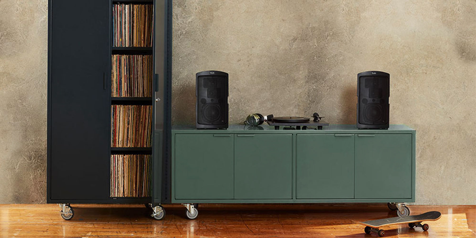 Heartwork Active Duty A/V credenza in deep green with record player and speakers in home setting