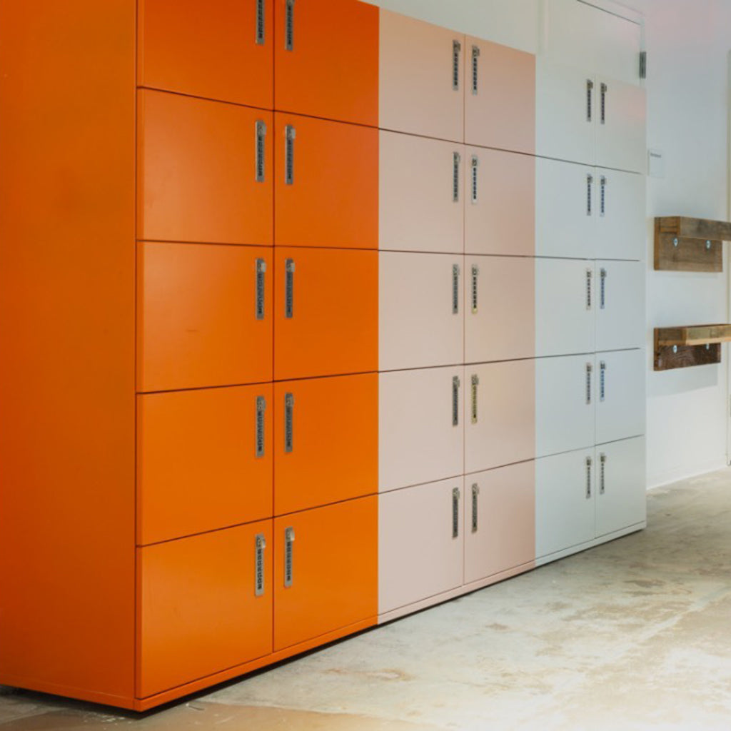 Heartwork Lockers against in different colours against the wall wall in office setting